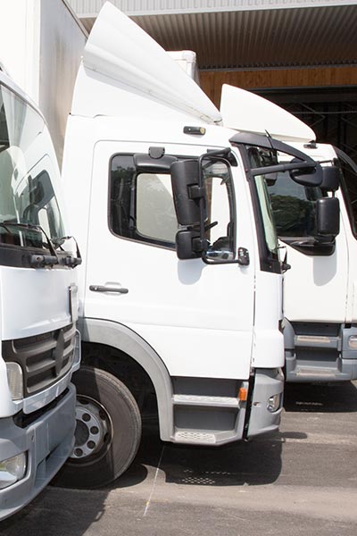 lorries in a formation side by side